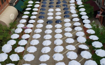 Downtown Wausau’s Umbrellas Offer Message of “Hope and love.”